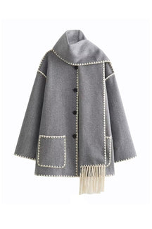Manteau tweed porté style décontracté vent