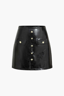 Mini-jupe noire simili cuir boutonnée élégante velours