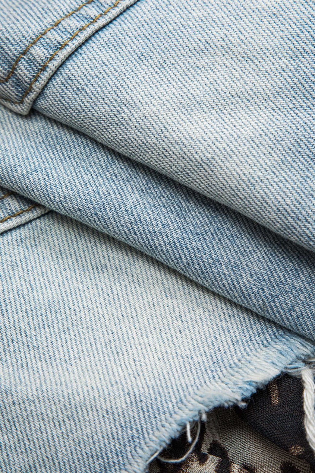 Mini jupe denim et volants léopard détail poches pluie