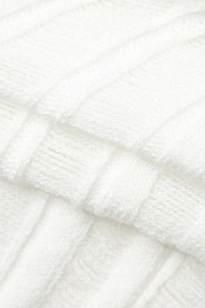 Robe moulante blanche asymétrique grâce