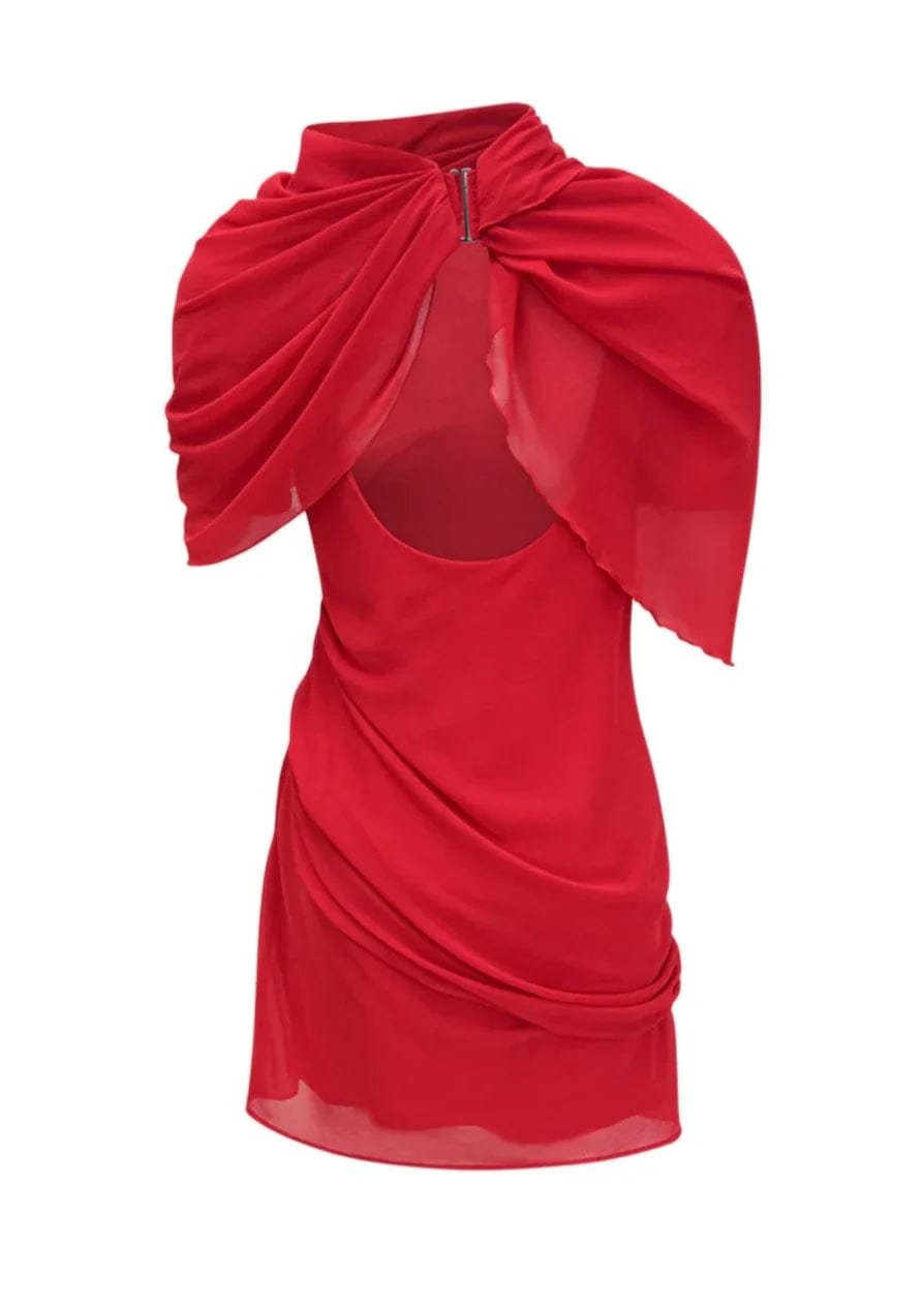 Détail des finitions de la robe rosée