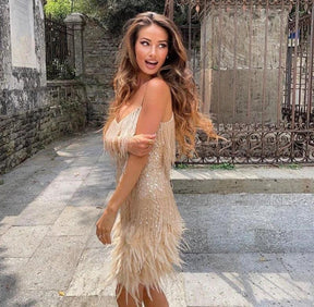 Robe blanche festive plume