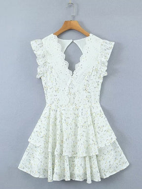 Robe dentelle blanche dos volants fleur