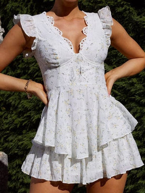 Mini robe dentelle blanche col V papillon