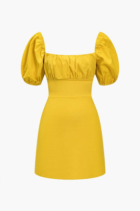 Robe mini drapée jaune vue de face soleil