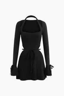 Robe dos nu noire élégante papillon