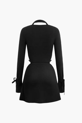 Robe courte moulante noire étoile