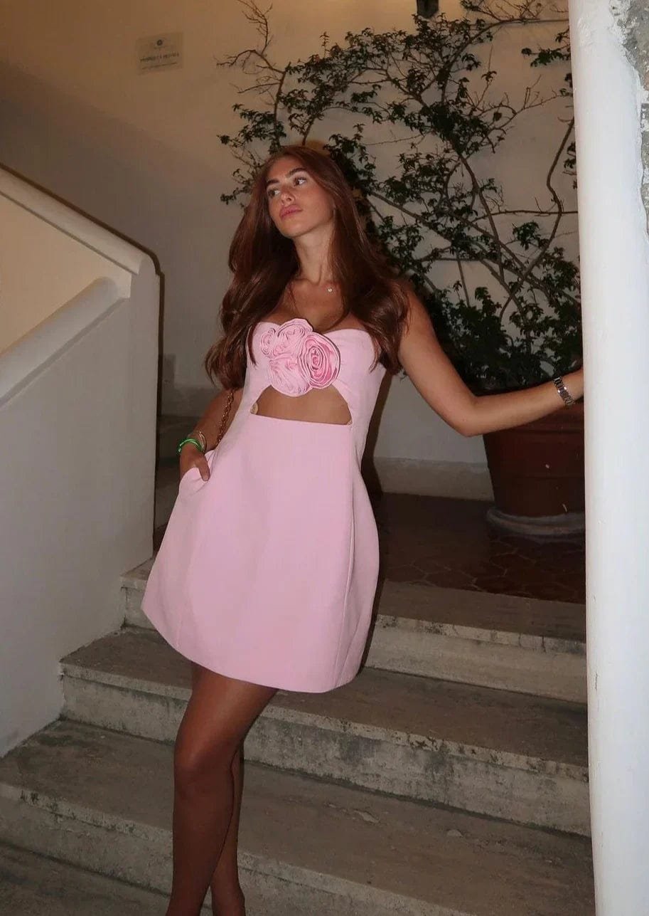Robe rose avec motifs floraux étoile
