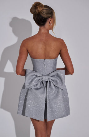 Robe cocktail pailletée détail tissu glitter