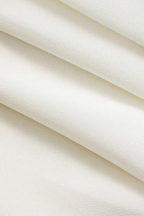 Robe mini blanche à volants détail tissu nuage