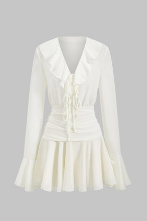 Robe mini blanche à volants vue de face papillon