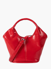 Détail couture sac cuir plume
