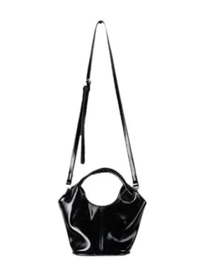 Mini sac en cuir vue de côté soleil