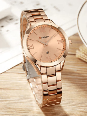 Montre Ella or rose vue de profil cristal