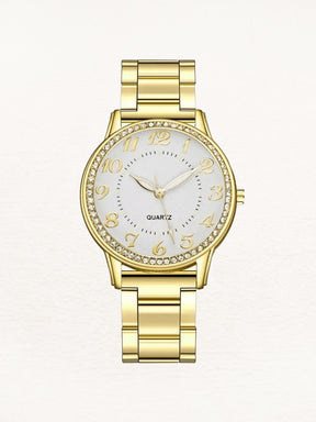 Montre dorée avec cristaux étincelants cadran blanc étoile