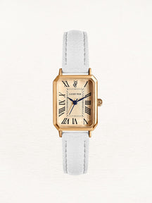 Montre carrée dorée avec bracelet blanc élégant brillant
