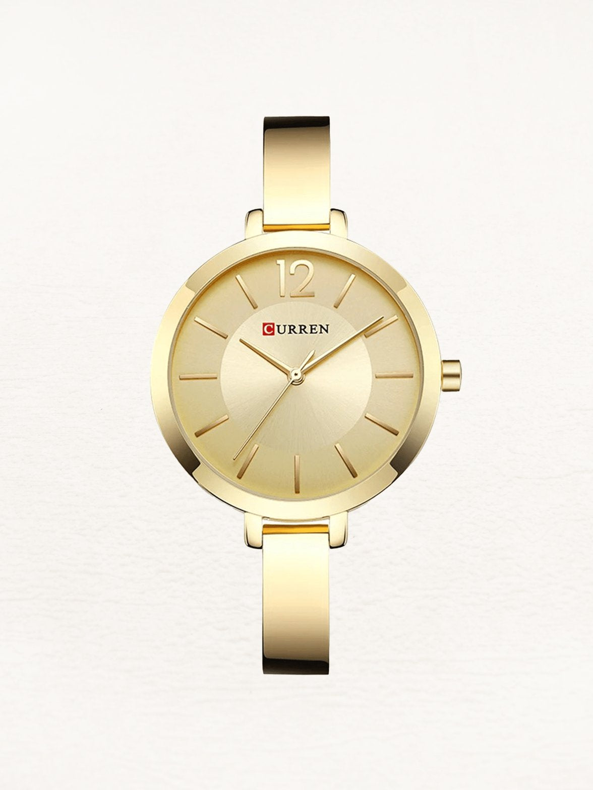 Montre dorée élégante femme - étincelle