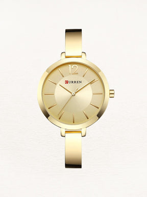 Montre dorée élégante femme - étincelle