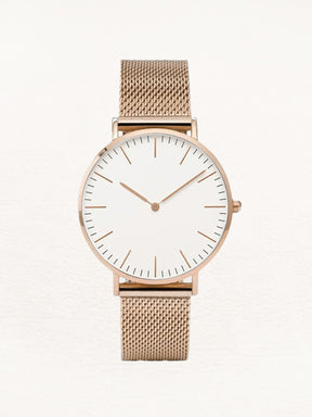 Montre élégante Daphne or rose avec cadran blanc minimaliste soleil