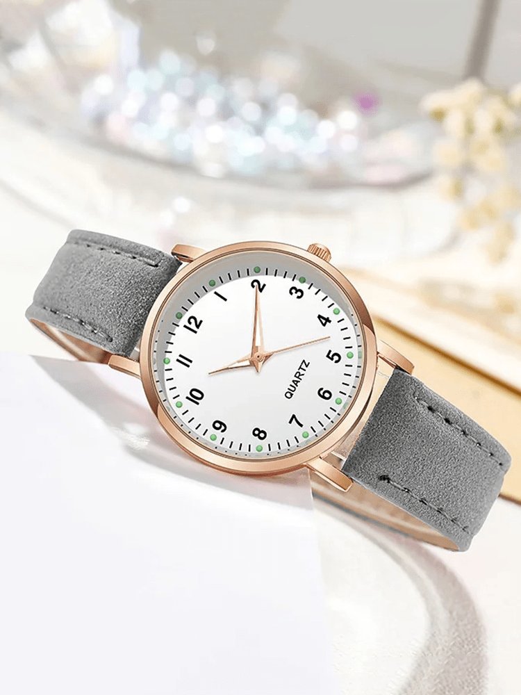 Montre élégante or rose avec bracelet cuir gris papillon