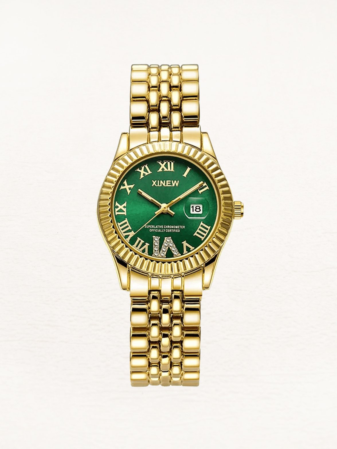 Montre luxueuse dorée avec cadran vert émeraude étincelle
