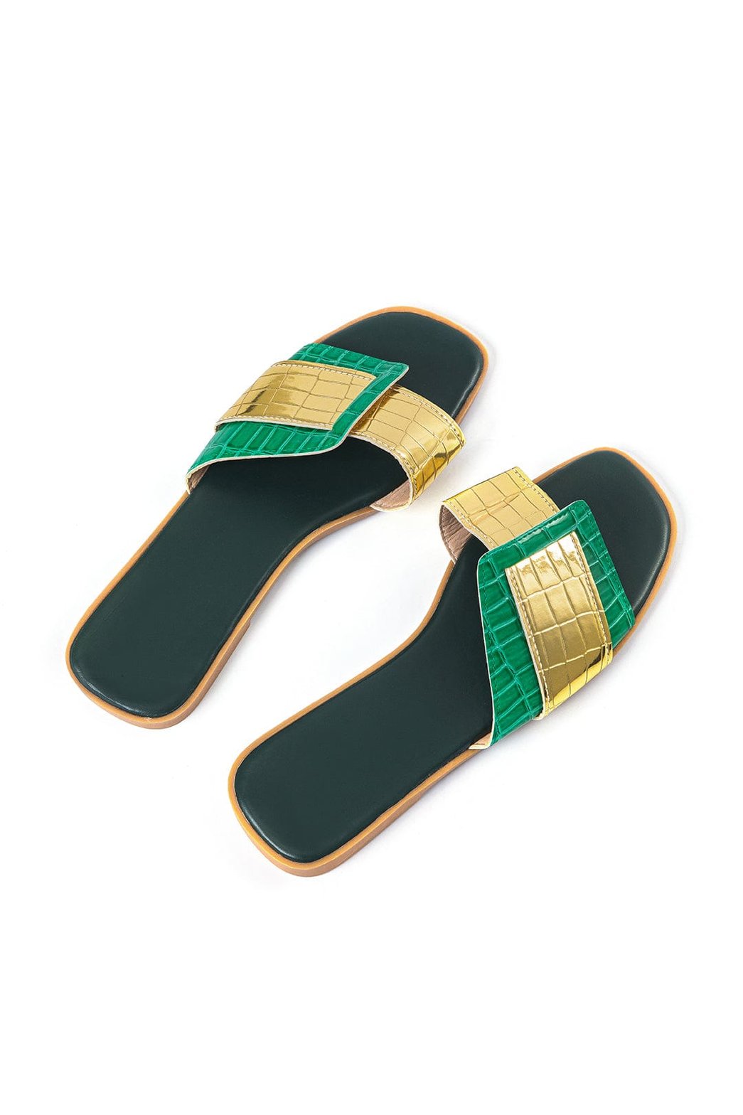 Vue latérale mules plates design luxe brise