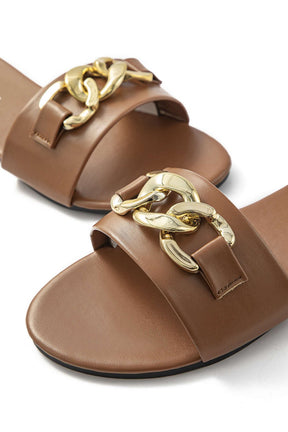 Vue dessus mule plate marron avec ornement doré nuage