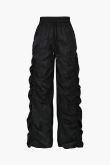 Pantalon cargo noir drapé élégant soleil