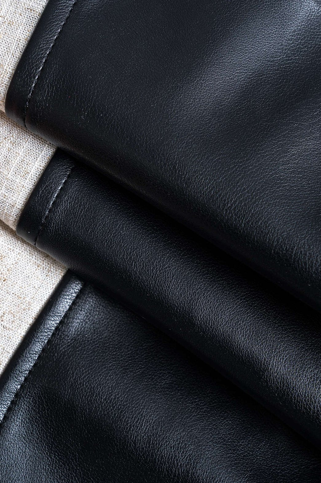 Pantalon large effet cuir design unique vague