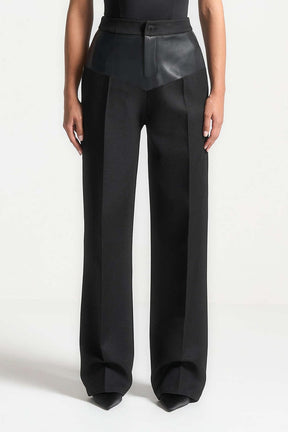 Pantalon patchwork noir élégant luxe