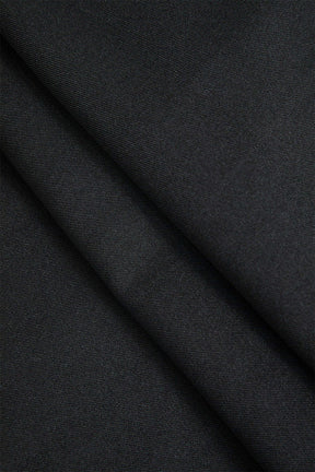 Vue de dos du pantalon asymétrique style