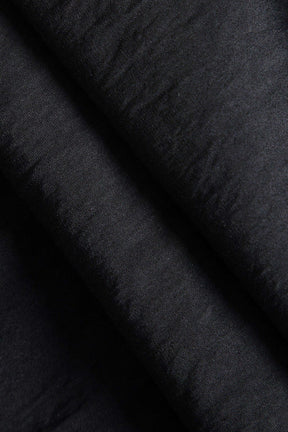 Pantalon large avec poches cargo noir étoile