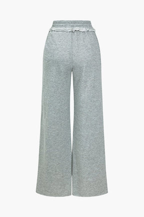 Pantalon ample avec poches étoile