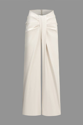 Pantalon large drapé blanc satin élégant soleil