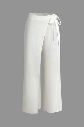 Pantalon large blanc en lin avec nœud décoratif soleil