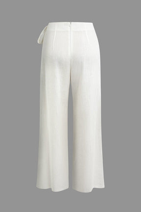 Pantalon en lin blanc coupe ample brise