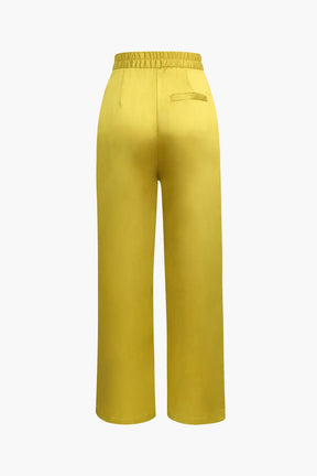 Pantalon satin jaune détail tissu fleur