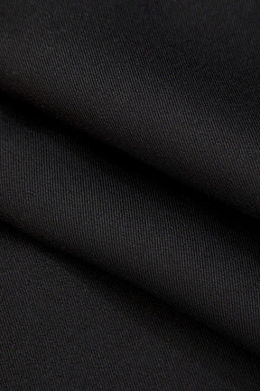 Vue arrière du pantalon large en simili-cuir noir chic