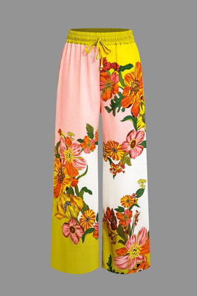 Pantalon large fleuri jaune et rose soleil