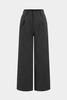Pantalon large en laine grise vue de face soleil