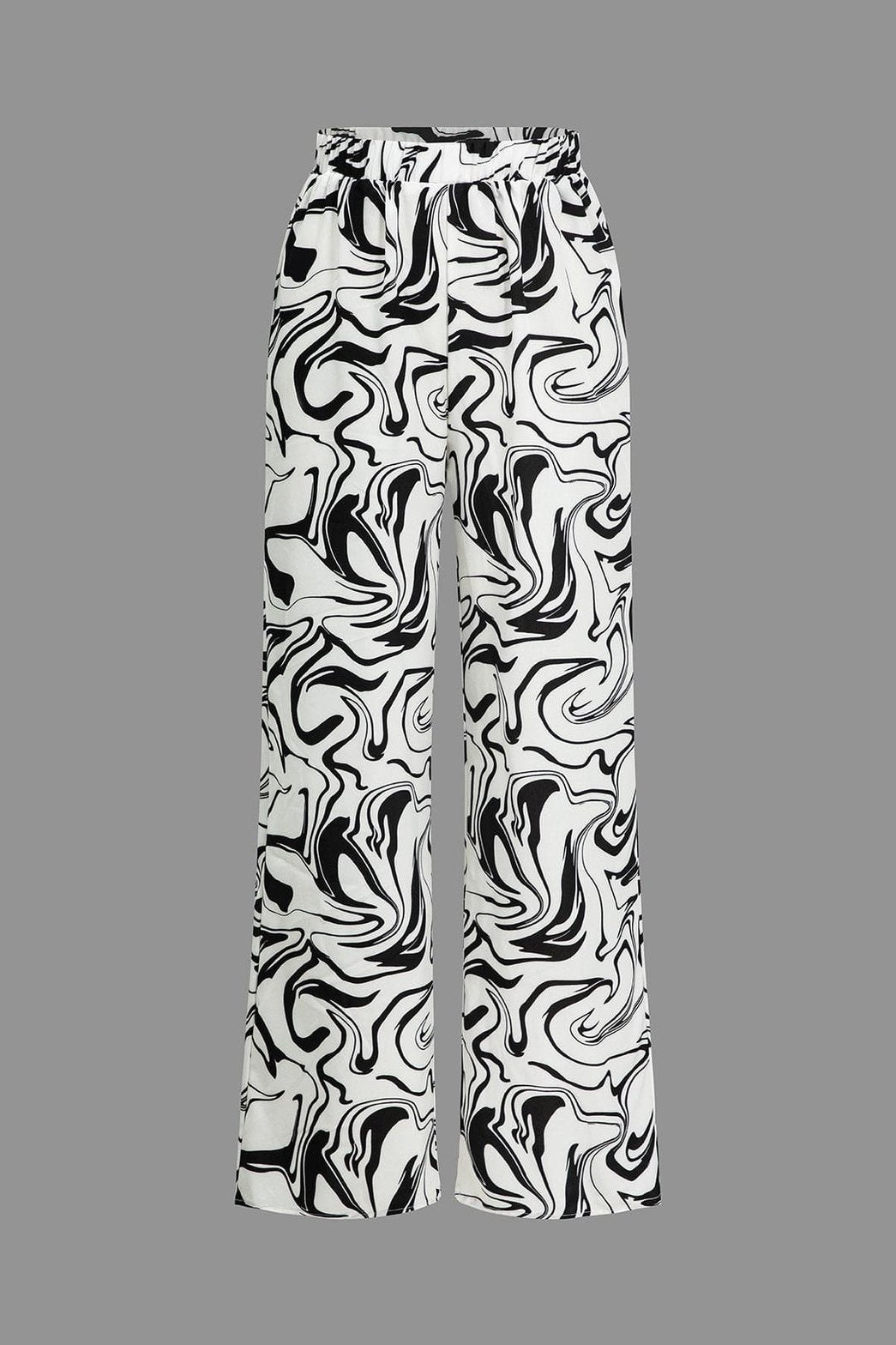Pantalon large marbré noir et blanc vue face soleil