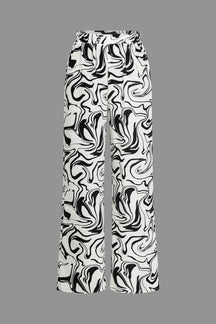 Pantalon large marbré noir et blanc vue face soleil