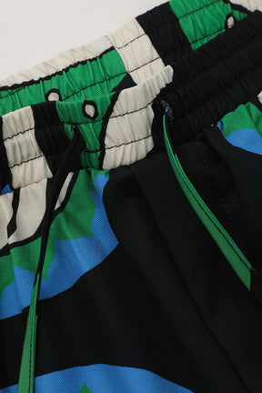 Pantalon léger à motifs graphiques vert lune