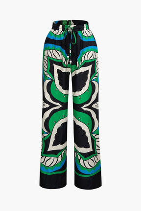 Pantalon large imprimé géométrique vert et bleu soleil