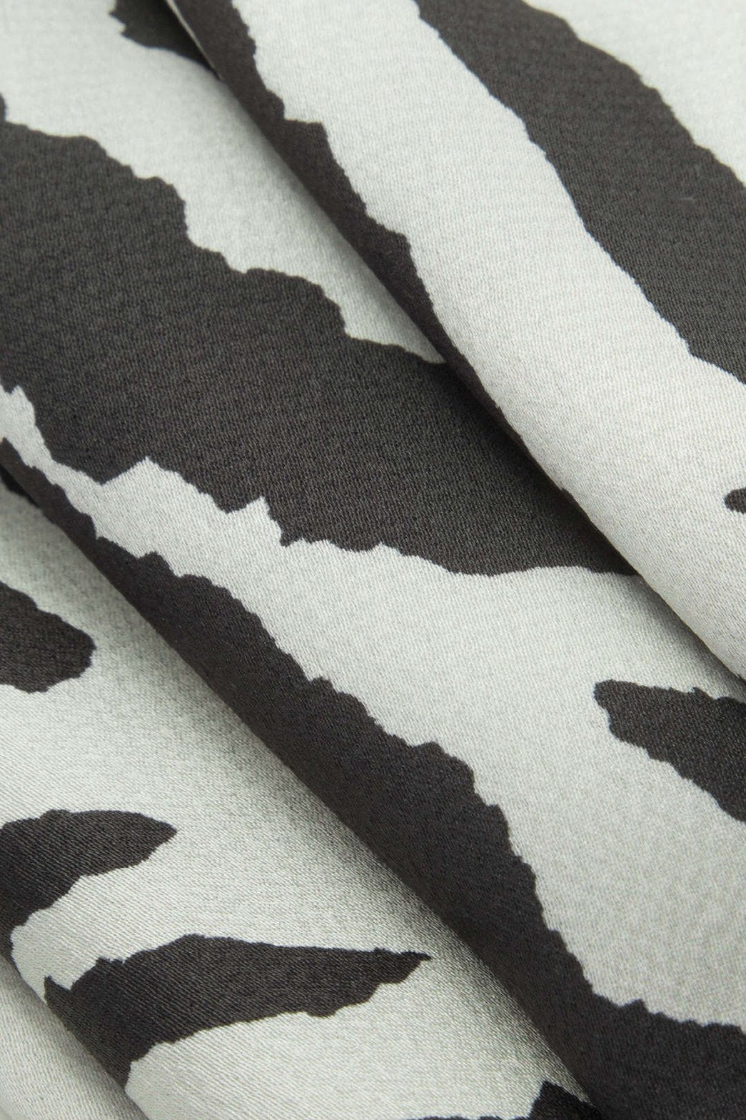 Pantalon palazzo imprimé zébré vue ensemble arc