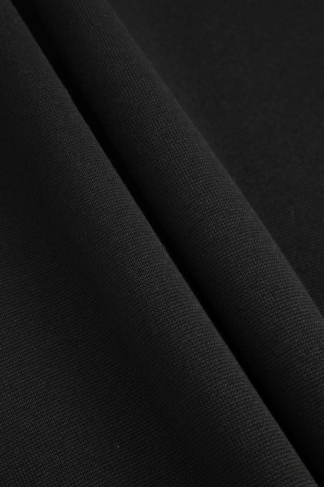 Pantalon palazzo noir à motifs floraux détail tissu nuage