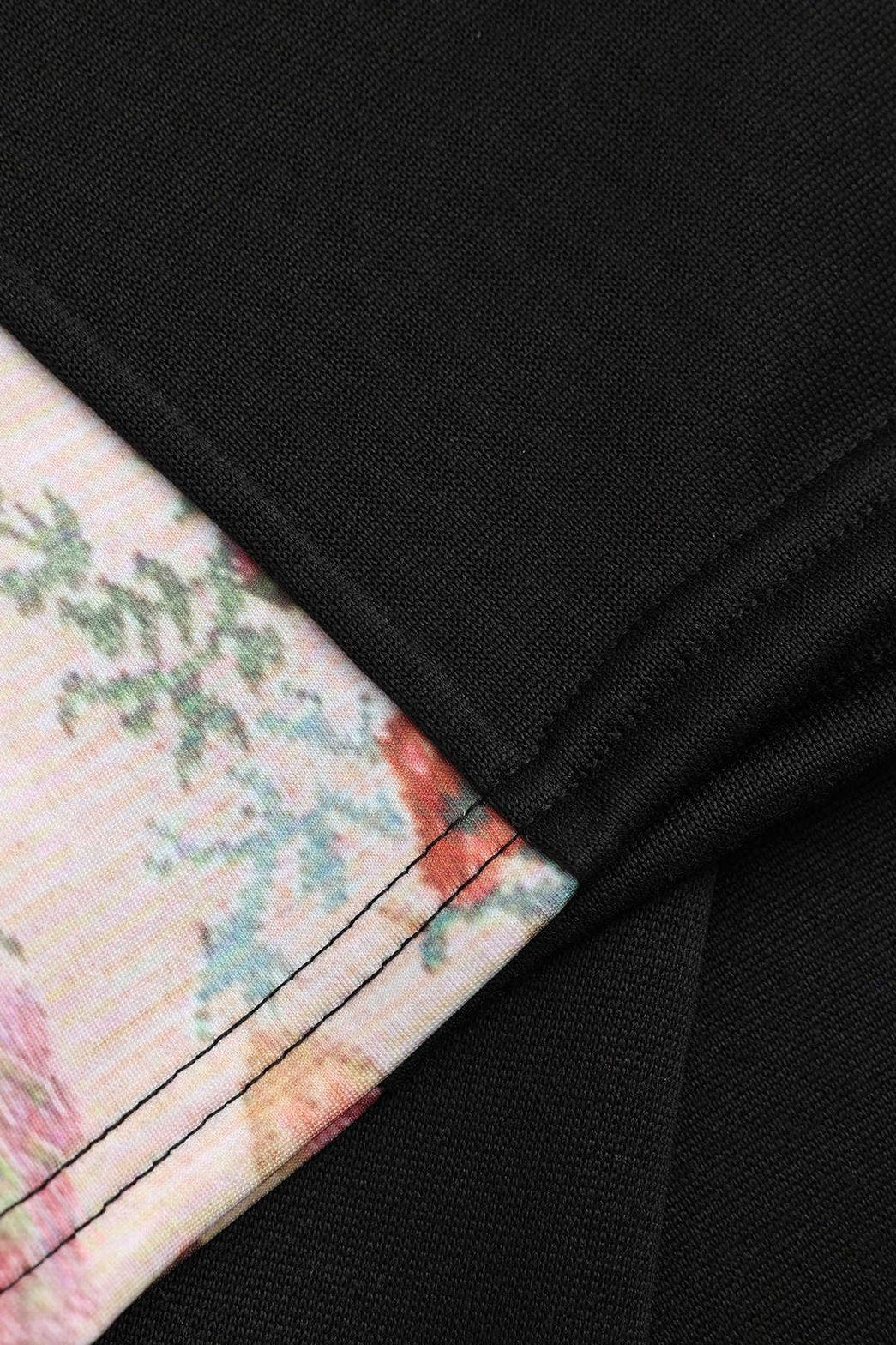 Pantalon palazzo noir à motifs floraux vue complète arc