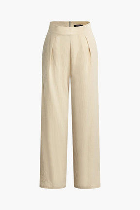 Pantalon large beige élégant soleil