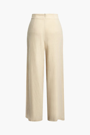 Pantalon ample plissé beige doux