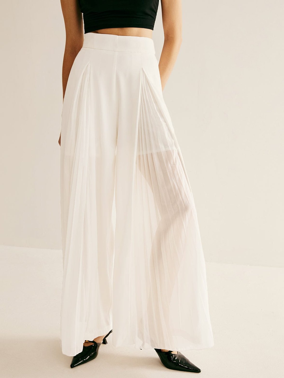 Pantalon plissé blanc élégant papillon